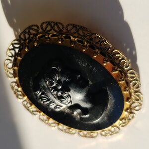 Vintage West Germany gold filigree black hematite cameo brooch pin